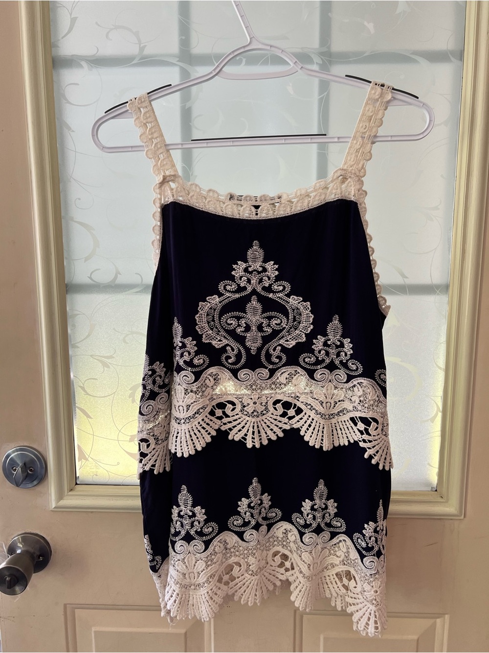 Anne French navy blue with white embroidery and lace straps tank top.